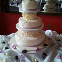 5 tier rose and piping cake