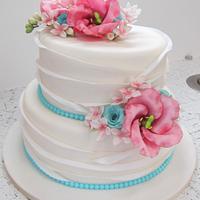 Wedding cake with sugar lisianthus, roses, freesia and bouvardia