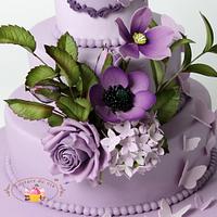 Purple cake with purple flowers