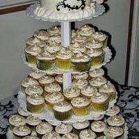 Wedding cupcakes, & top tier cake. Gold, black & burgundy.