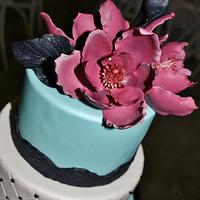 5 tiered cake with fantasy magnolias