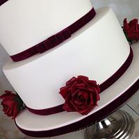 Red velvet Roses and White feathers