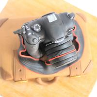 camera on suitcase cake 