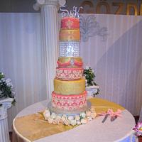 Salmon and gold indianstyle wedding cake