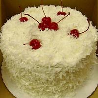 Fresh coconut cake with pineapple filling 