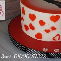 Couple silhoutte and hearts airbrushed cake