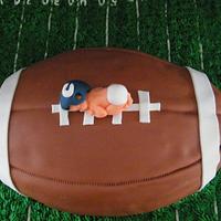 Football themed baby shower cake