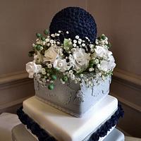 off set square, lace, cushion & ruffles wedding cake.. with flower ball! :)