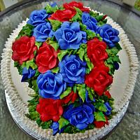 Vibrant Buttercream roses on 2-tier cake