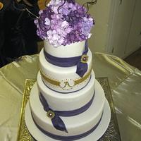 Purple Hydrangea and gold wedding cake