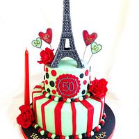 "La Vie En Rose" . Paris theme cake with Eiffel tower and red roses.
