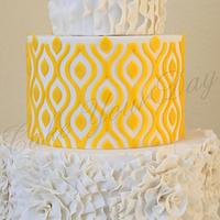 White & Yellow anniversary cake.