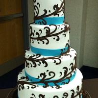 Brown scroll wedding cake