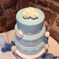 Blue and white lace wedding cake