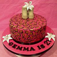 Pink leopard print cake with UGG boots and lilies (totally random I know)