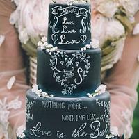'It must be love' chalkboard wedding cake