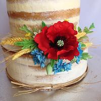 Naked Wedding cake with meadow flowers