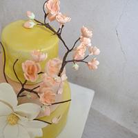 Gold and cherry blossom wedding cake