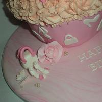 shoe and handbag themed giant cupcake
