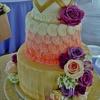 Gold, coral, and purple BC wedding cake