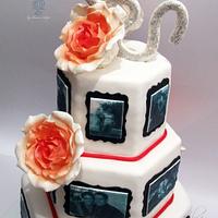 Wedding cake with bride and groom pictures