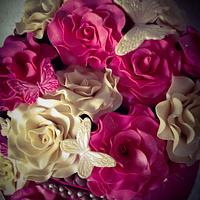 Pink and cream open roses cake