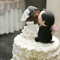 wedding cake with customized couple topper
