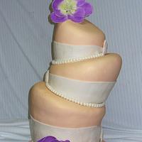 topsy turvy style wedding cake
