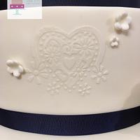 simple stencilled ivory with sugar flowers
