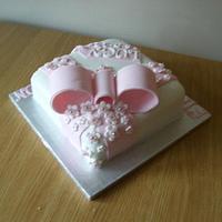 Flowers and bows holy communion cake