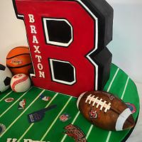 Sports theme Letterman cake first Birthday 