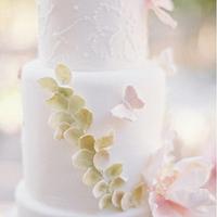 Romantic wedding cake and dessert table