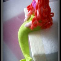 Mermaid-themed cake topper