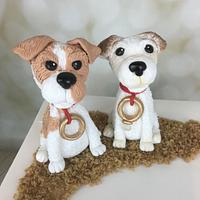 Two dogs  in the sand engagement  cake 