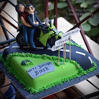 Couple on a bike cake