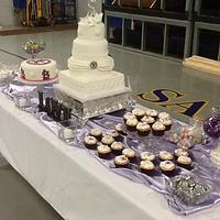Wedding cake with sweets table 