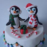 christmas cake with penguin topper