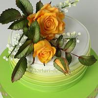 Cake with yellow roses and lily