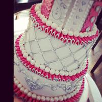 Pink, white and silver wedding cake