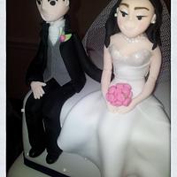 Bride & Groom topped wedding cake 