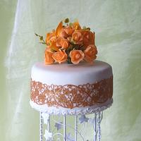 Wedding cake with roses and callas