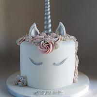 Silver pink and grey unicorn cake