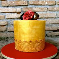 Golden cake with roses