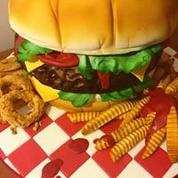 Giant Hamburger cake, fries and onion rings