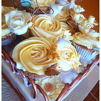 Golden birthday cake with hand made flowers