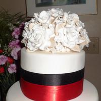 Black and Red Ribbon Cake with White Rose Bouquet