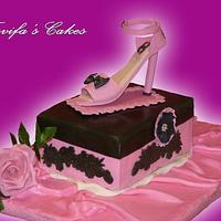 Cake with shoe and rose