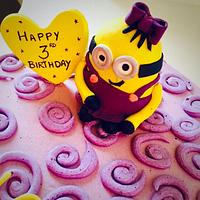 A purple minion cake