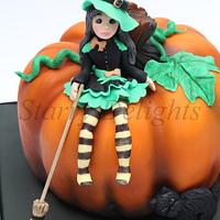 Cute witch on Pumpkin