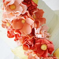 Pale Mint rustic buttercream with coral tone ruffle flowers